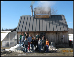 Fairfield Center School - Project Sweet Talk is a sugaring unit that the sixth, seventh, and eighth-grade students participate in at Fairfield Center School. Each year the sixth graders go out and interview local maple sugarers about history, marketing, tapping, gathering, and boiling. The seventh graders learn about the maple tree, caring for the sugarbush, and the economics of sugaring. The eighth graders do the tapping, gathering, and the boiling. Throughout, community members are called upon for their expertise!