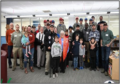 Veterans Breakfast and Ceremony - Saint Albans City School (SACS) Team USA's 7/8th grade learning community organized a breakfast and appreciation ceremony for veterans. Coffee and donuts were served by students in the school library to veterans and their family members. The breakfast was followed by a ceremony of music and three short speeches. This breakfast and ceremony had the best turnout of veterans, students, and teachers seen in many years.